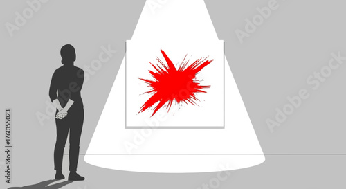 Person admiring abstract red splash painting in gallery spotlight.