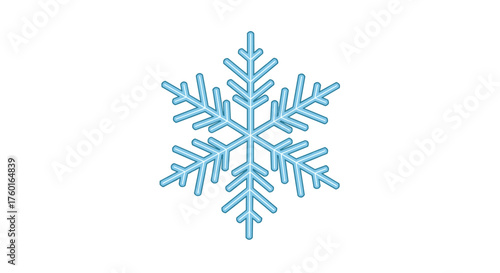 A close up detailed view of a beautiful intricate blue snowflake falling gently during a winter storm.