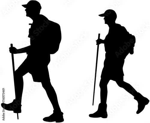 Silhouettes of two hikers with backpacks and trekking poles