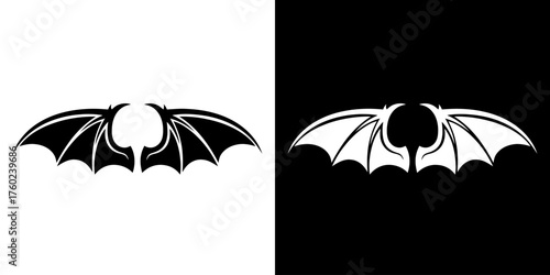 A symmetrical graphic design featuring a pair of stylized bat wings, presented in both black on white and white on black.