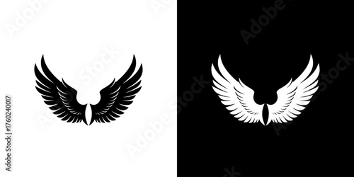 A symmetrical pair of stylized wings, one black on white and the other white on black, symbolizing duality and contrast.