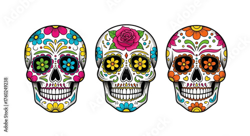 Three sugar skulls decorated with colorful flowers and patterns, a traditional symbol of the Day of the Dead.