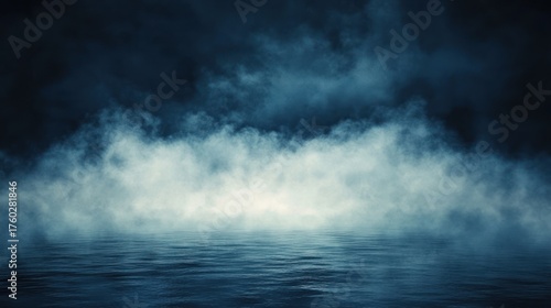 Dense fog hovering over calm dark water under a moody night sky, creating an eerie and mysterious atmosphere