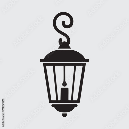 Black Silhouette of a Hanging Street Lantern with a Candle