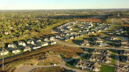 Building residential neighborhood. Aerial view of new construction houses. Establishing shot of Midwestern United States