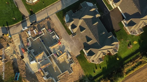 Building residential neighborhood. Aerial view of new construction houses. Establishing shot of Midwestern United States