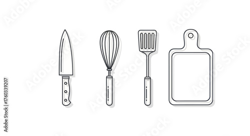 Set of four essential kitchen utensils: knife whisk spatula and cutting board.