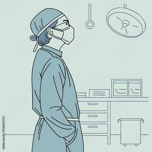 Surgeon in mask and cap in operating room