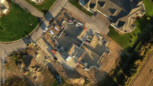 Building residential neighborhood. Aerial view of new construction houses. Establishing shot of Midwestern United States