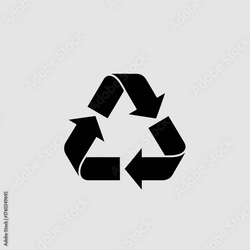 A simple black recycling symbol, representing environmental conservation and the importance of reusing materials to reduce waste and promote sustainability in our modern world.