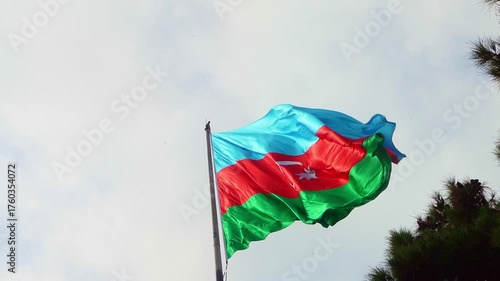  Azerbaijani flag flying on the flagpole