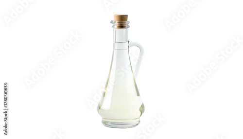 Clear liquid in glass decanter with handle and cork stopper