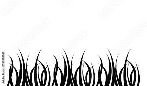 Black silhouette of tall grass blades against a white background