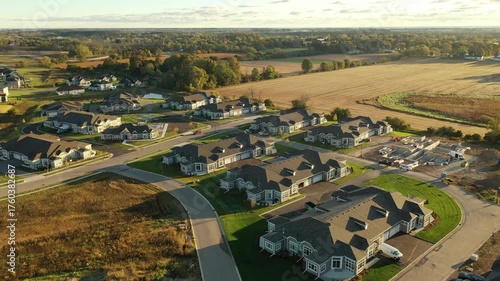Building residential neighborhood. Aerial view of new construction houses. Establishing shot of Midwestern United States