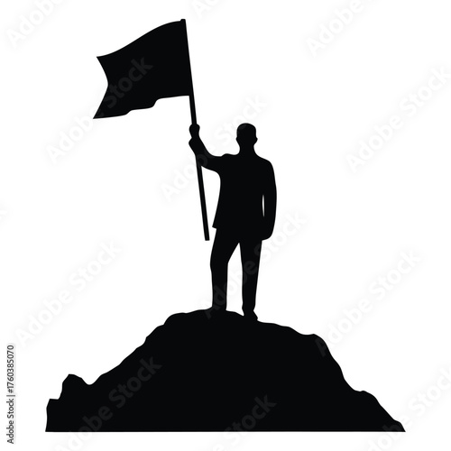 Silhouette of a Successful Businessman Standing on a Mountain Peak Planting a Flag