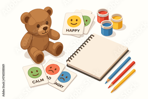 Teddy bear with emotion flashcards, coloring supplies, and notebook for child learning