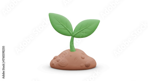 A small green plant sprout with two leaves crafted from modeling clay emerging from a mound of brown soil.