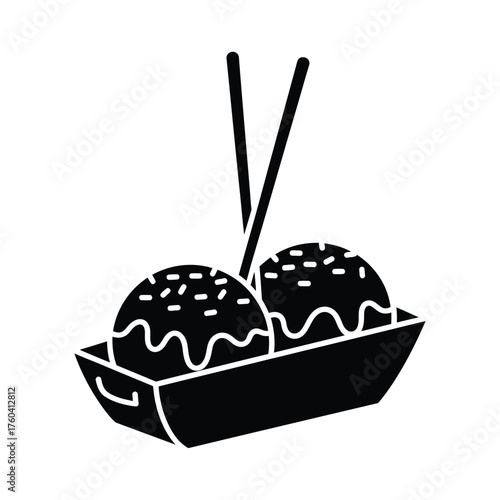Black takoyaki with chopsticks in a tray japanese food