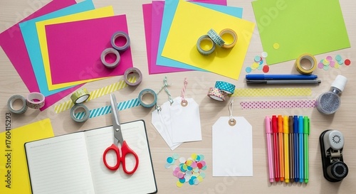 Craft supplies and colorful paper sheets on wooden table