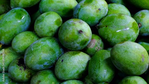 Close-up of Green Mangoes at a Local Fruit Market in Indonesia 