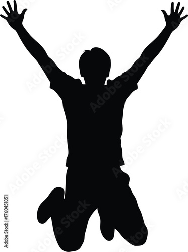 Silhouette of a man jumping with arms raised in celebration