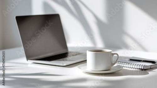 Minimal modern office desk etup laptop coffee cup