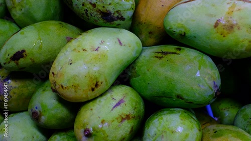 Close-up of Green Mangoes at a Local Fruit Market in Indonesia 