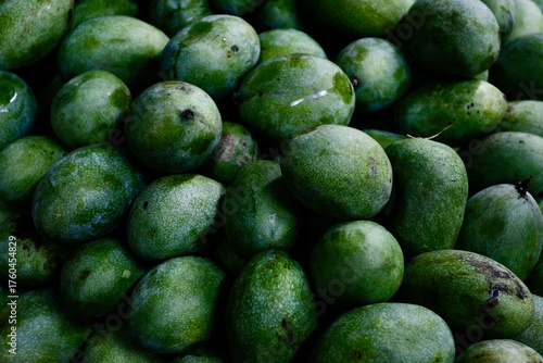 Close-up of Green Mangoes at a Local Fruit Market in Indonesia 