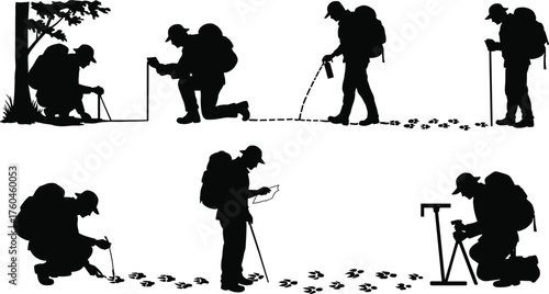 Silhouette of wildlife tracker measuring animal footprints, nature researcher documenting tracks, outdoor survival expert studying footprints in wild forest trail