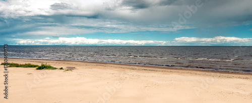 Panorama. Cloudy day on sand dunes and beach of the Baltic Sea, Jurmala - fam...