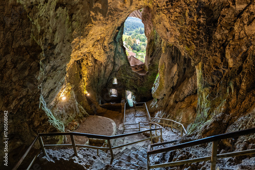 Interior of the cave carved into the rock of Predjama Castle overlooking the outside, Slovenia.