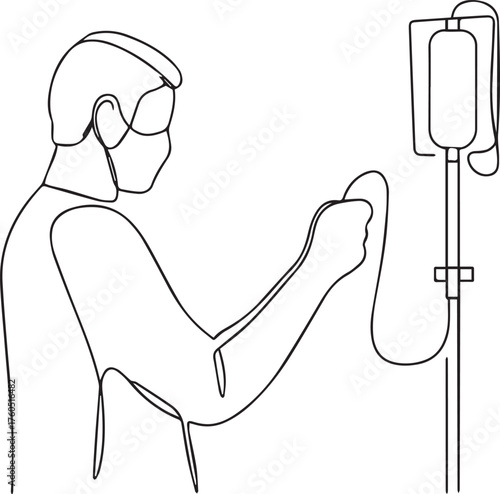 Medical professional in mask adjusting iv drip bag on stand