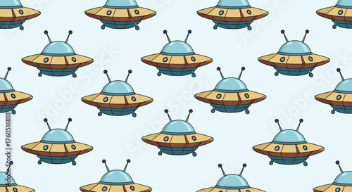 A pattern of pixelated flying saucers in yellow and blue on a light blue background.