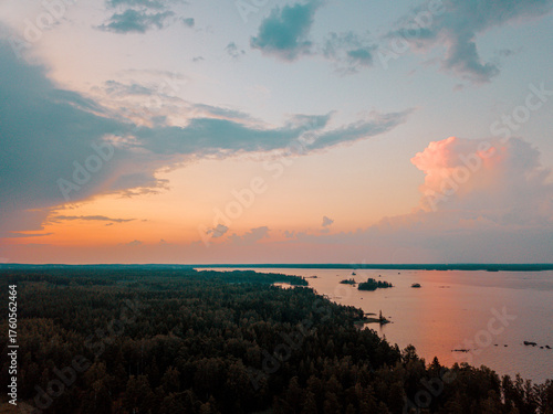 Panoramic aerial drone shot in the Finnish archipelago at sunset.