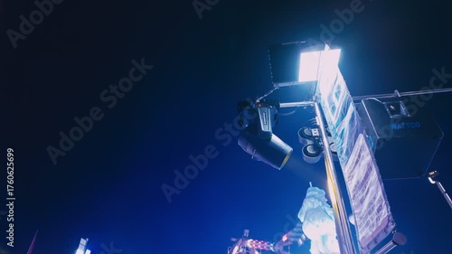 Hull fair, fairground ride. Neon lights, lasers.