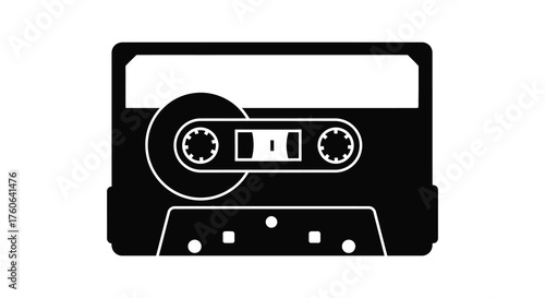 Retro audio cassette tape for music playback and recording in a stark black silhouette