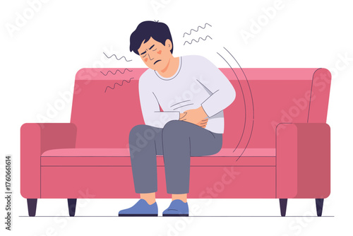 Man experiencing abdominal pain and discomfort while sitting on a sofa, illustrating a medical condition or health issue
