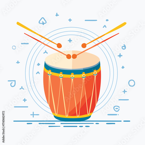 Traditional Indian Dholak Drum with Drumsticks.