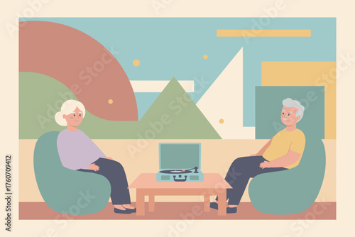 Happy senior couple relaxing at home listening to music on a vintage record player Leisure