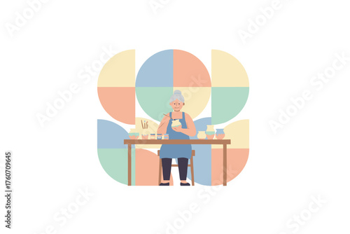 Elderly woman painting pottery enjoying a creative hobby Focus on artistic leisure activity
