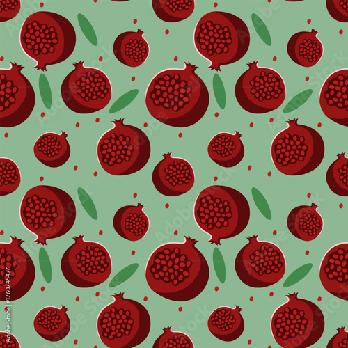Seamless pattern with ripe red pomegranates and green leaves on a light background. For textile design, packaging, wallpaper, wrapping paper, kitchen decor, and fabric prints. Fresh fruit pattern 