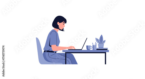 A focused woman works remotely on her laptop at a desk