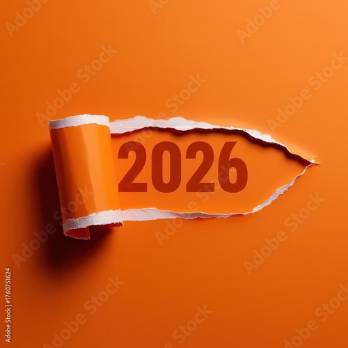 A vibrant orange background revealing the year 2026 through a dynamic torn paper effect