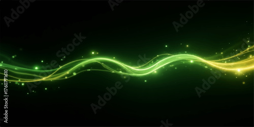 Abstract glowing green and yellow energy wave with sparkling particles on black background
