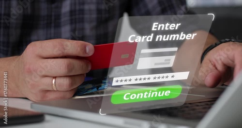 Man holding red credit card in front of laptop with digital message Payment Denied. Concept of failed transaction, banking error, or insufficient funds.