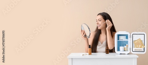 Beautiful young woman with ...
