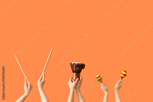 Female hands with drumstick...