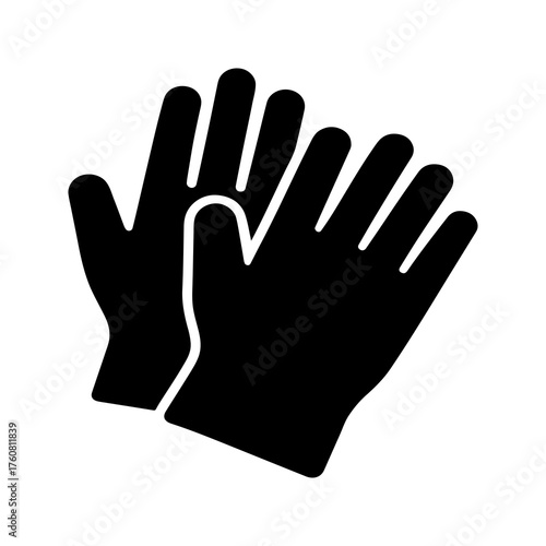 Black silhouette of a pair of protective work gloves for hand safety and protection during manual labor
