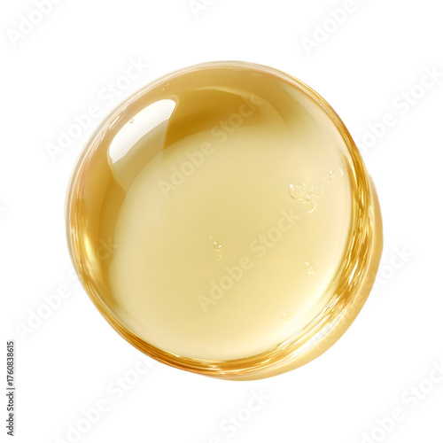 Golden liquid serum texture. Macro cosmetic oil swatch with bubbles isolated on black. Skincare product drop top view.