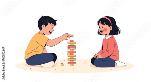 Two young children are playing a game of building a tall tower with blocks.